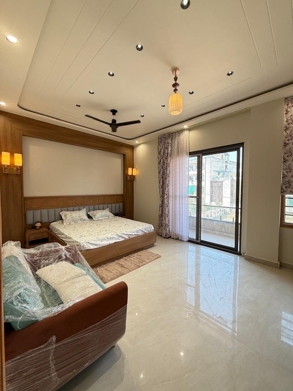 Master bedroom with balcony access