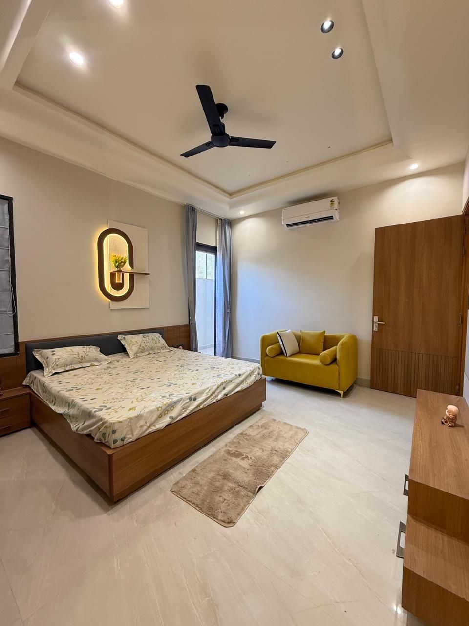 Bedroom with wardrobe and seating