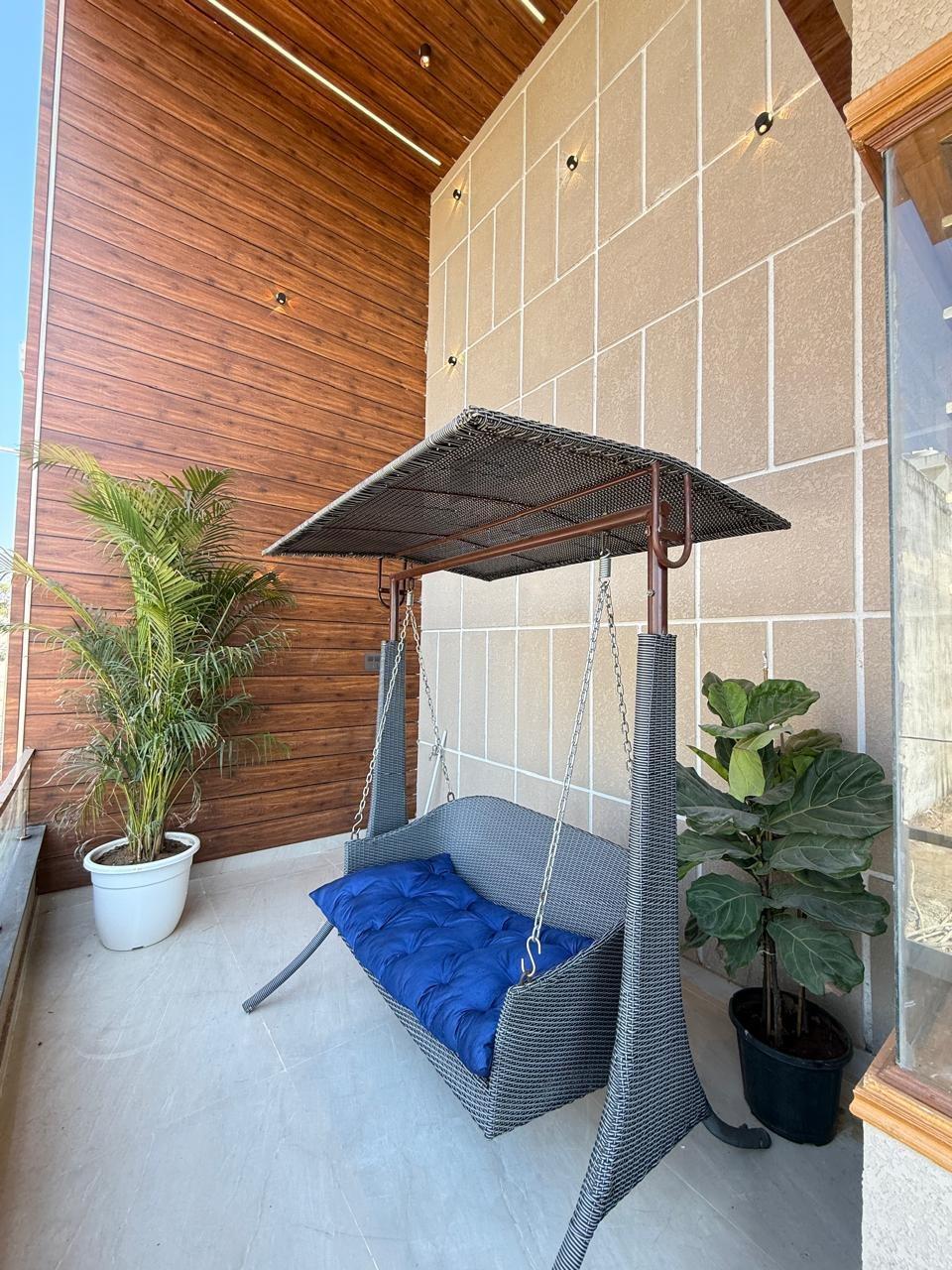 Balcony with swing seat
