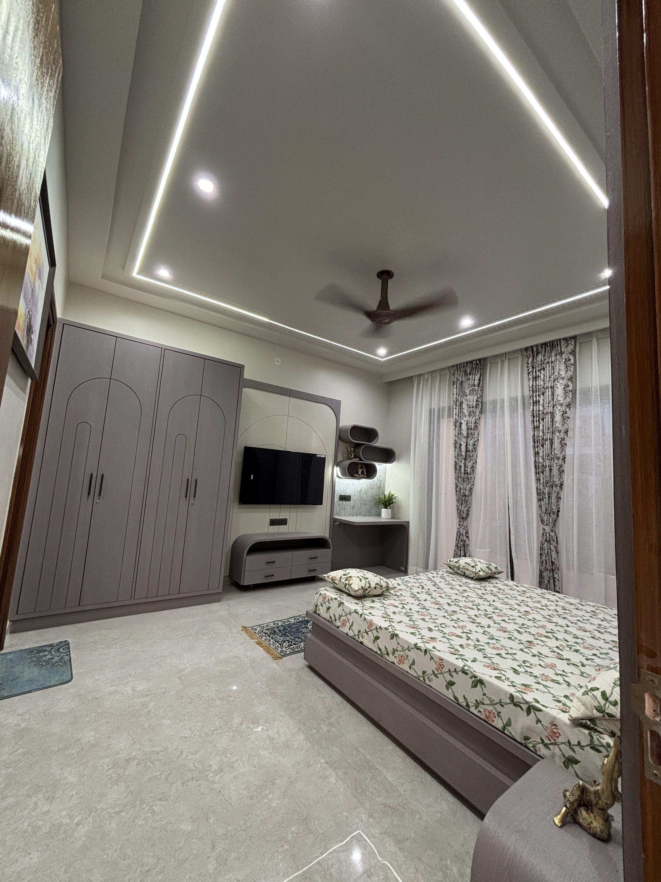 Bedroom with full-height wardrobes
