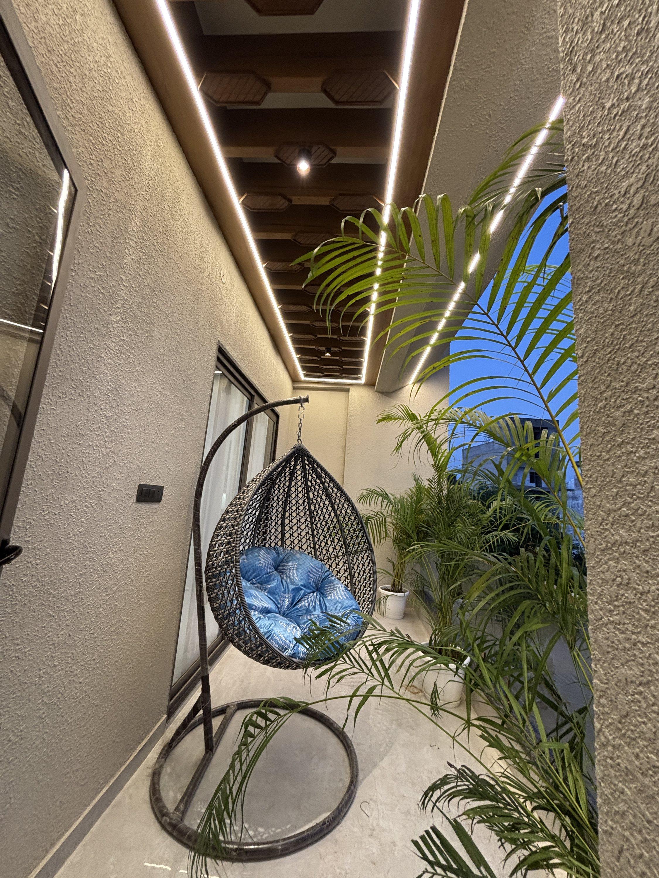 Balcony with hanging swing chair