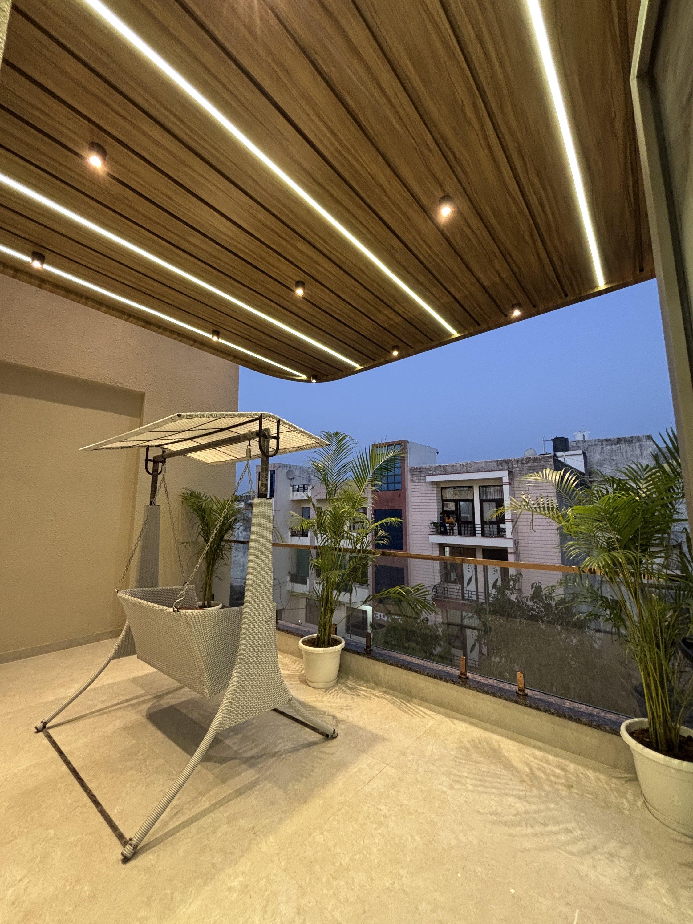 Balcony with wooden ceiling and swing