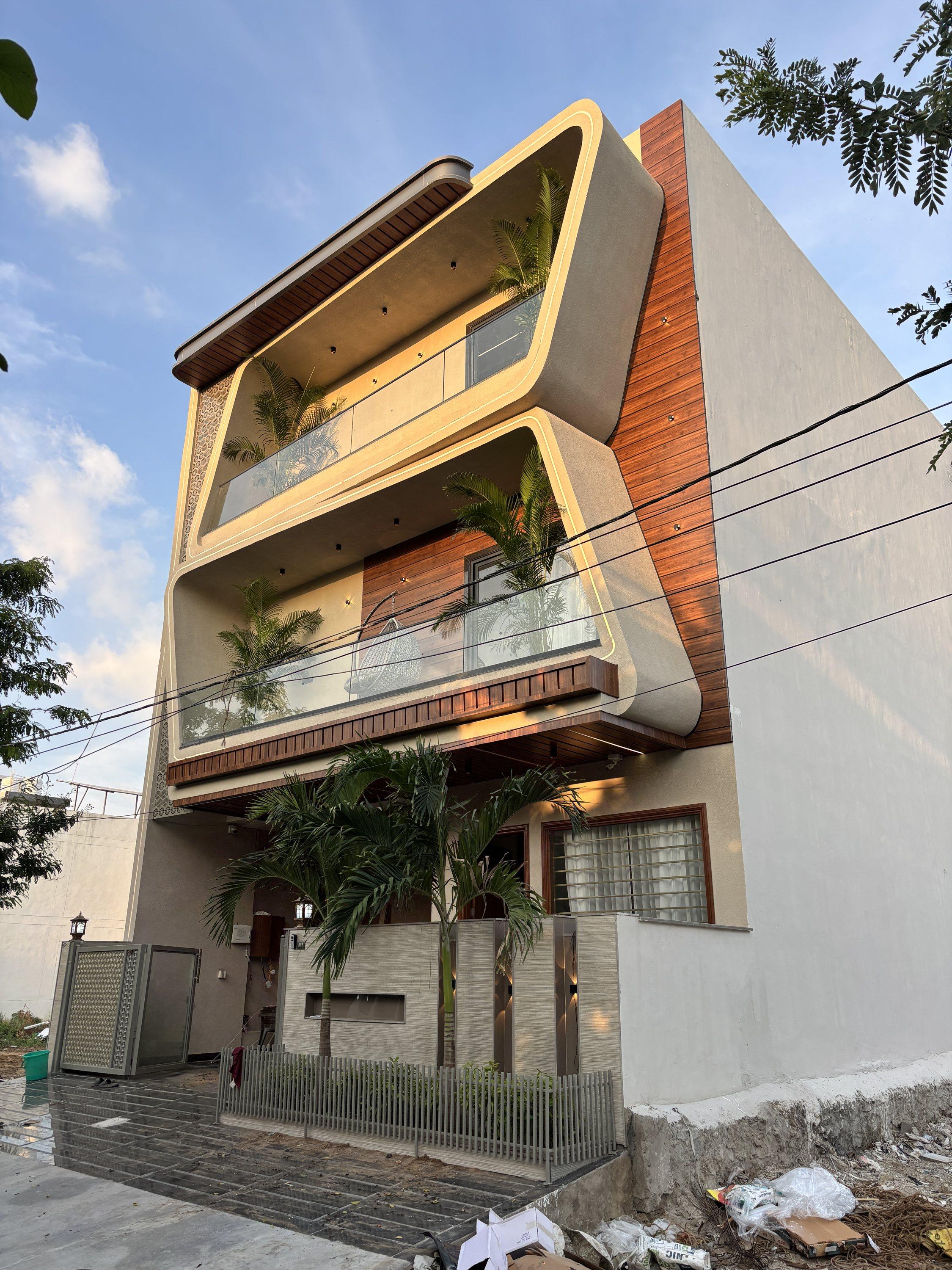 Front elevation with curved balconies