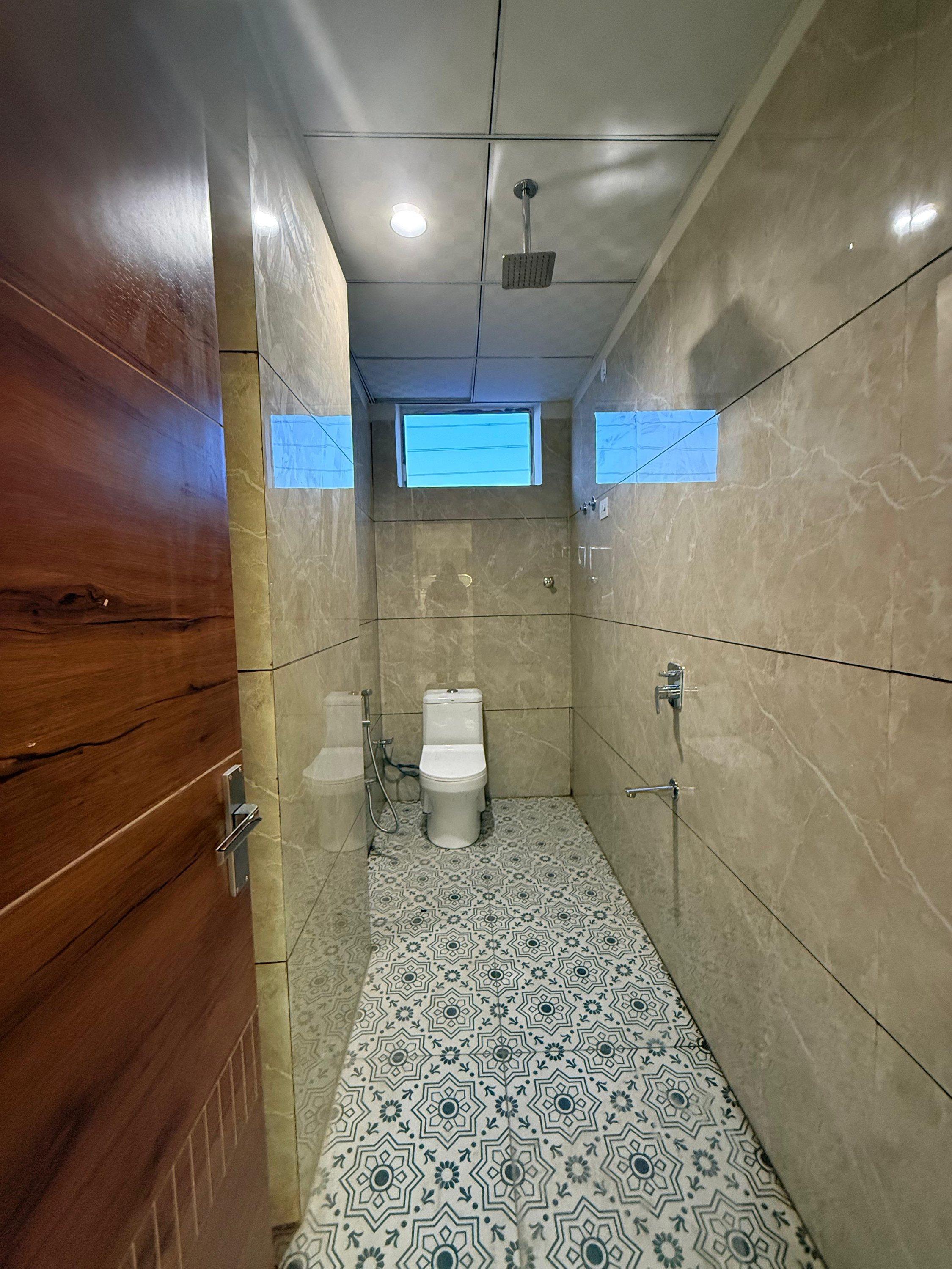 Bathroom with wood-finish wall